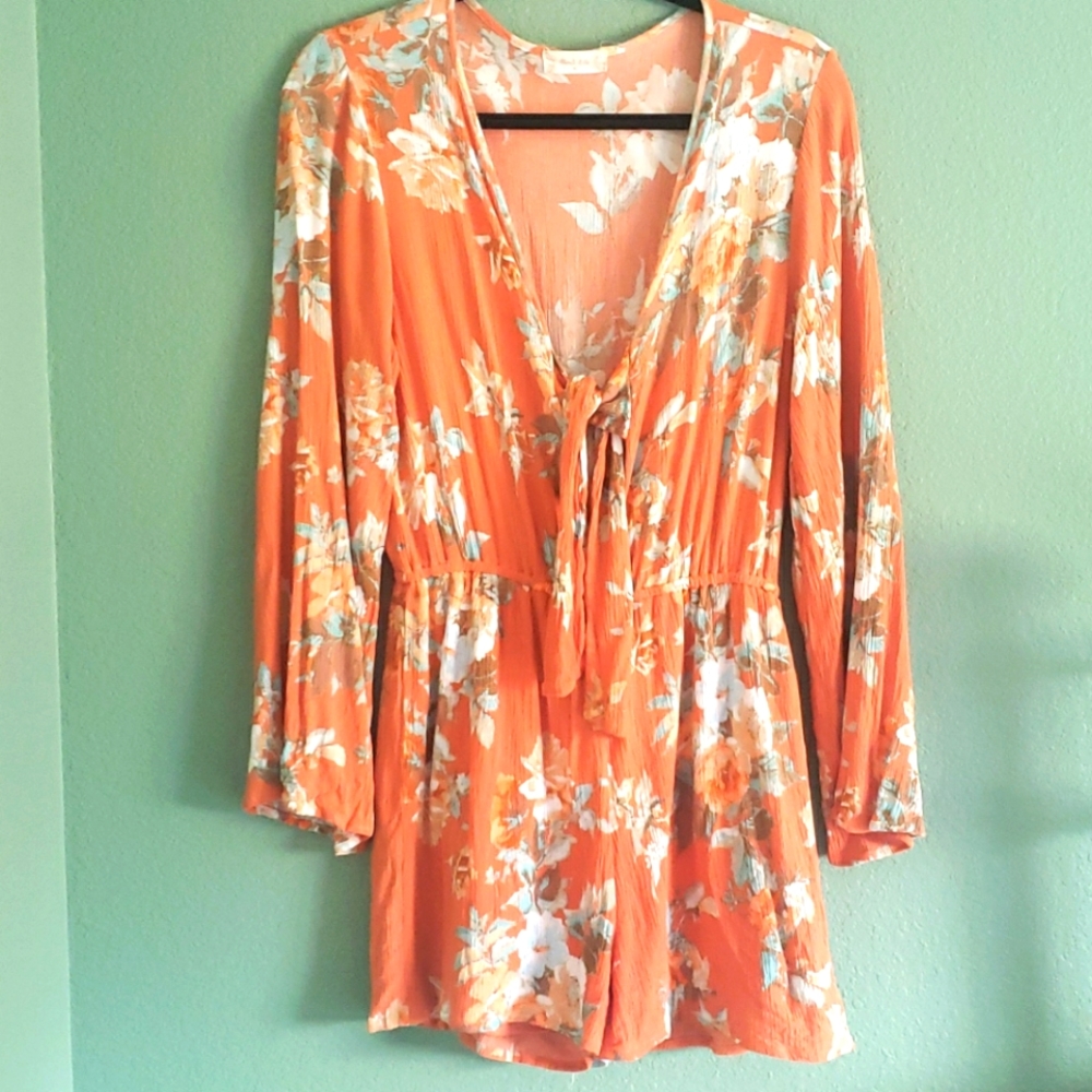Coral long sleeve romper